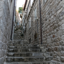 Narrow stairways go up and up the hillside.