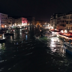 Canals at night are all lit with restaurants and clubs.
