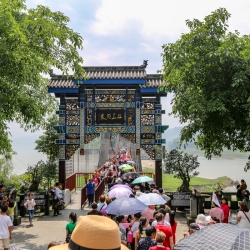 Gateway to the Shibaozhai pagoda. The bridge is a bouncy suspension bridge.