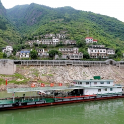 Thousands of villages along the river were relocated hundreds of feet uphill. Millions of people were displaced by the rising waters from the dam.