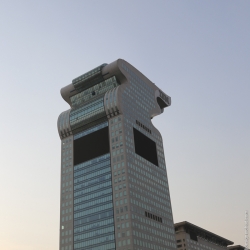 Beijing building in the shape of an olympic torch.