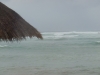 Protected by a reef, the waves won\'t completely destroy the beach.