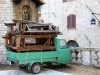 A bunch of pews in a little truck, Assisi, Italy