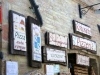 Signs on a building in Montefalco.